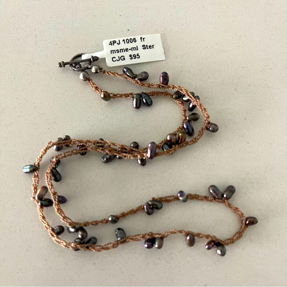 One of a kind freshwater chocolate pearls crocheted into a necklace 16” long.